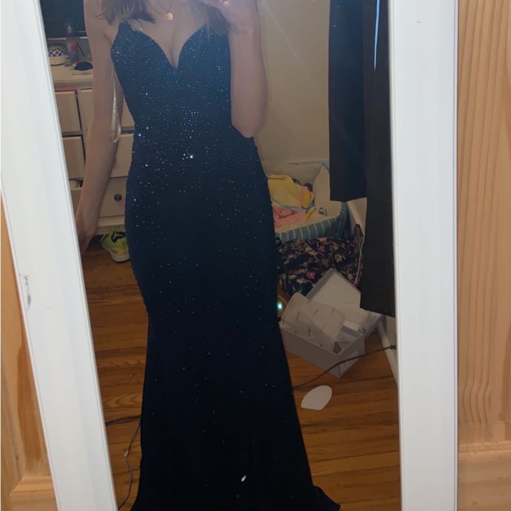 Size 0 navy blue prom dress. No alterations. Non smoking home. $150 obo